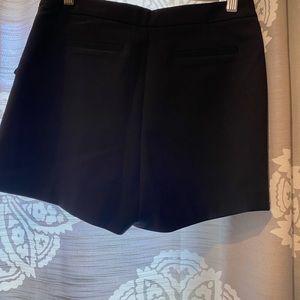 Size medium black shorts with fringe style pockets